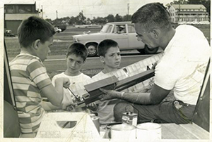 The Author's dad and brothers making repairs to a free-flight  model at the U.S. Nationals sometime in the early 1960s. Read more at https://www.flyingmag.com/blogs/going-direct/domestic-drone-casualties#I8K3gmviFBlO7UIV.99